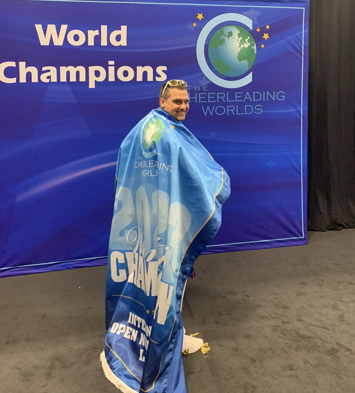 Charles wrapped in a World Champion banner